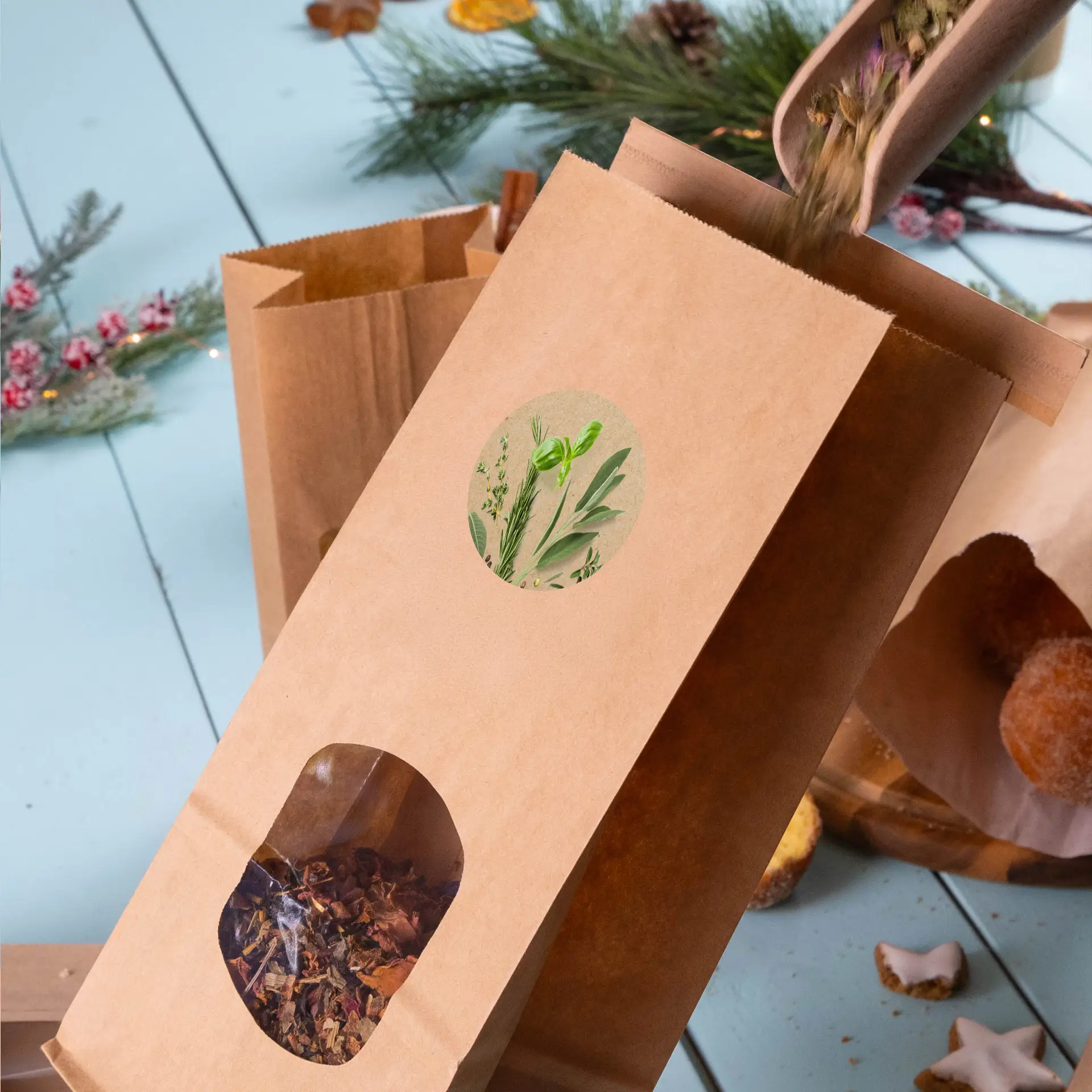 Brown kraft paper bag with a circular label showing green plants, revealing herbal contents through a clear window.