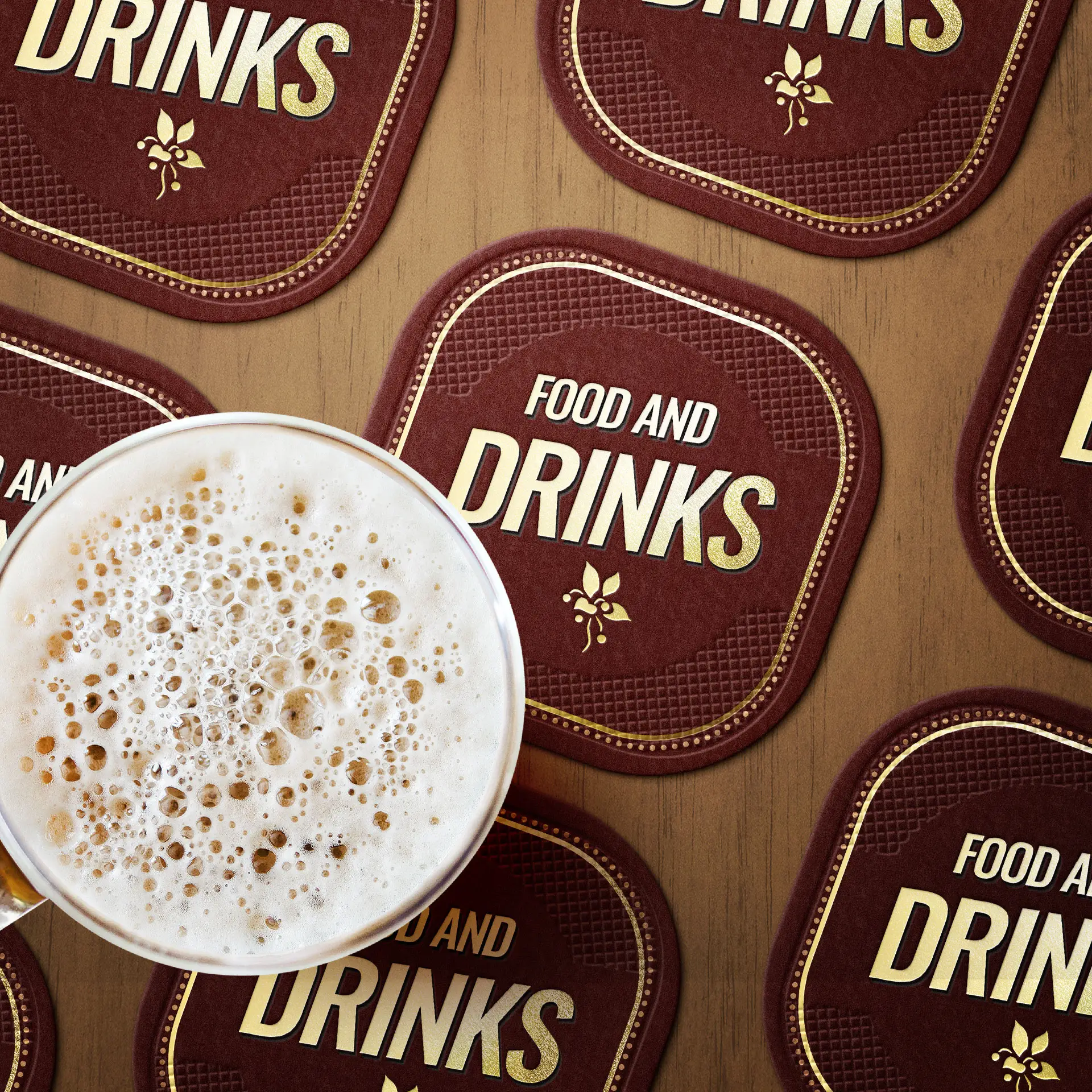 Beige beer coaster with "FOOD AND DRINKS" text, surrounded by multiple similar coasters on a wooden surface.